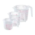 Set of three food-grade transparent plastic measuring cups with handles and red metric scales - Set