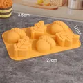 Orange 6-cavity silicone cake mold with leaf and acorn shapes for DIY holiday baking - 6-Cavity Leaves Mix