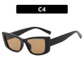 Retro small frame cat eye sunglasses featuring black acetate frames and brown lenses - Black Frame Tea Lens