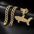 Detailed macro view of hip hop iced-out gold shark pendant on a heavy Cuban link chain - 45cm (18 Inch) Cuban Chain Set / Gold