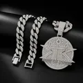 Close-up of iced out King of Kings pendant and rhinestone Cuban link chain bracelet set - 18 Inch Cuban Chain / Silver