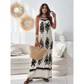 Elegant white maxi dress with black floral print and spaghetti straps for summer resort - S / Dresses / Apricot