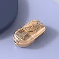 Portable Japanese-style pill cutter and storage box with amber gold finish and clear lid - Pill Cutter / Transparent Yellow