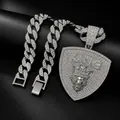 Detailed view of silver iced out Cuban chain with lion head KING shield pendant - Silver Pendant with Cuban Chain / 18 inch