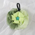 High-quality soft two-tone green bath loofah sponge with central flower and hanging loop - Green Dual-Color Bath Ball