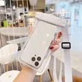 Universal white waterproof phone pouch with adjustable shoulder strap for swimming and diving - Glow in the Dark / White