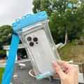 Blue waterproof smartphone pouch with adjustable lanyard for swimming and diving - Sequin Style / Light Blue