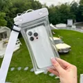 White waterproof phone pouch with adjustable crossbody strap for swimming and outdoor use - Sequin Style / White