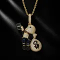 Detailed view of hip hop money boy pendant with cubic zirconia on gold rope chain - With Twisted Chain / Gold