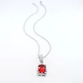 Macro view of a silver necklace featuring a sparkling rectangular red gemstone pendant - Rope Chain Necklace / 20 inch / Silver Red