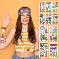 Vibrant hippie temporary tattoos with peace signs and floral designs shown on model - Hippie Tattoo Stickers (E001-010) / 10 Sheets Set