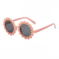 Adorable pink daisy flower sunglasses for kids featuring round dark UV protection lenses - Orange Pink Gradient Frame Gray Lens