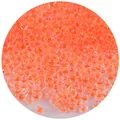 Primer plano de cuentas de vidrio transparentes con un núcleo teñido de naranja vibrante - 2.0mm / Paquete de 20g / Naranja Transparente