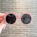 Fashionable pink cat-ear children's sunglasses with dark lenses and full UV protection. - Coffee Frame Grey Lens
