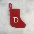 Red knitted Christmas stocking with white embroidered letter D - Letter D / 18*15cm
