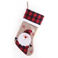Linen Christmas stocking featuring a red and black plaid cuff and Santa Claus appliqué - Santa Claus