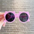 Cute pink cat-ear shaped sunglasses for kids featuring black lenses for UV protection - Matte Purple Frame Grey Lens