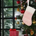 Cozy pink and white knitted Christmas stocking hanging on a festive decorated tree - 14*9*0.8cm / Pink