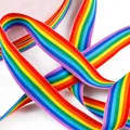Macro detail of vibrant rainbow woven polyester ribbon showing texture and stripes - Price Per Yard / 10mm
