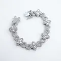 Detail of silver four-leaf clover and infinity link bracelet with iced-out rhinestones - 8inch(20cm) / Silver