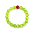Modieuze uniseks groene kattenoog steen kralen armband met een rode accent kraal - Groen Kattenoog