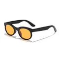 Trendy black frame sunglasses with orange lenses in a minimalist studio background - Black Frame Orange Lens
