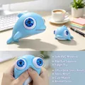 Blue dolphin eye-popping squeeze fidget toy made of soft PVC for office stress relief - Blue Whale