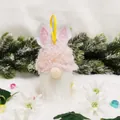 Cute Easter gnome plush ornament with bunny ears and yellow hanging loop for decor. - Pink