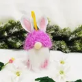 Decorative pink Easter faceless gnome candy jar featuring rabbit ears and a white beard - Rose Red