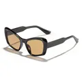 Trendy black cat-eye sunglasses featuring oversized frames and amber lenses for women - Black Frame Light Tea Lens