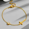 Detailed view of titanium steel gold cross bracelet with clear rhinestone accent - Cross Bracelet (N460) / Gold