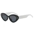 Vintage black oval cat-eye sunglasses with contrasting white temples and star rivets - Black Frame White Temple Gray Lens