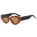 Stijlvolle ovale zonnebril voor dames met luipaardprint en gouden sterdetails - Tortoise Frame Zwarte Poten Thee Lens