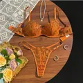Macro view of delicate rose embroidery on sheer orange lingerie set - S / Top And Bottom / Caramel color