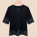 Elegant black crew neck T-shirt with intricate lace splicing on sleeves and hem - M / Tops / Black