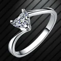 Elegant silver-toned ring featuring a sparkling heart-shaped cubic zirconia detail. - 5 / Silver