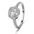 Detailed view of an elegant vintage halo engagement ring with round cubic zirconia - 6