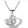 Elegant silver heart-shaped pendant necklace with a large clear crystal and water wave chain - White