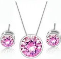 Detail of silver necklace and earring set featuring round pink AAA zircon stones - Pink