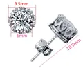 Elegant silver crown stud earrings featuring a sparkling 6mm round cubic zirconia. - Silver