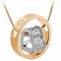 Elegant rose gold and silver heart necklace with rotating crystal charm for women - Two-Tone White Rhinestone / K9 / Gold and Silver Two-tone