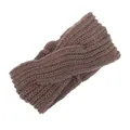 Detail view of the brown hand-knitted crossover wool headband with textured knit pattern - Khaki