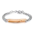 Macro view of 316L stainless steel cross bracelet with rose gold engraved ID plate - 20cm / Women's Style (Rose Gold/Silver)