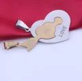 Close-up detail of stainless steel arrow through heart couple pendant with YOU LOVE engraving - Pendant Only (Without Chain) / Gold