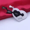 Detail of stainless steel couple necklace featuring an arrow and heart pendant design. - Pendant Only (Without Chain) / Black