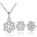 Detailed close-up view of a sparkling snowflake zircon necklace and stud earrings set - Necklace and Earrings Set