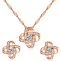 Elegantes Set aus Roségold-Schmuck mit Halskette und Ohrsteckern mit Sternmotiven. - Roségold
