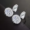 Elegant silver halo stud earrings with brilliant round-cut clear zircon stones. - April (White)