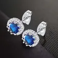 Elegant round blue zircon halo stud earrings for women, December birthstone - September (Deep Blue)