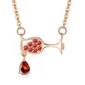 Close-up of rose gold wine glass necklace with sparkling red zircon water drop pendant. - Rose Gold (Red Zircon)